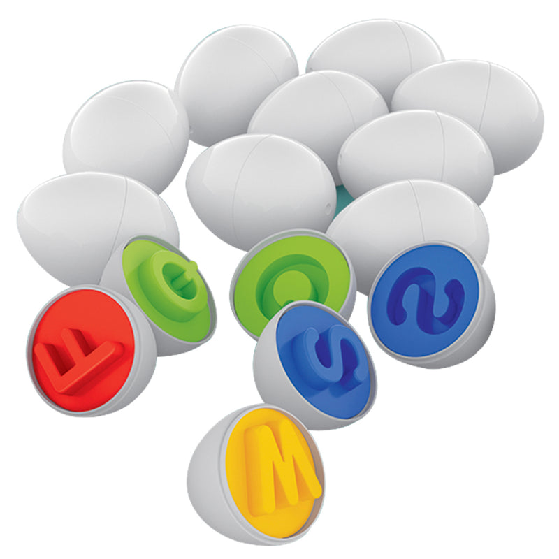 Load image into Gallery viewer, Alphabet Eggs set showing white eggs opened to reveal colourful letter interiors in red, green, blue and yellow
