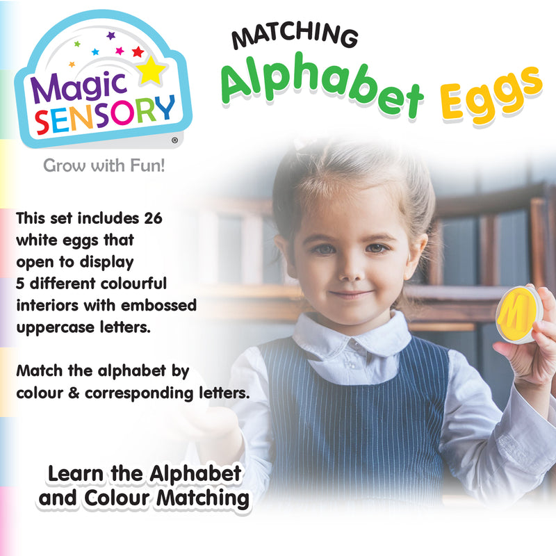 Load image into Gallery viewer, Child holding a yellow egg half with the letter M, smiling at camera
