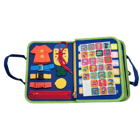 Busy Board open showing fine motor page with buttons, buckles, laces, zipper and alphabet stickers