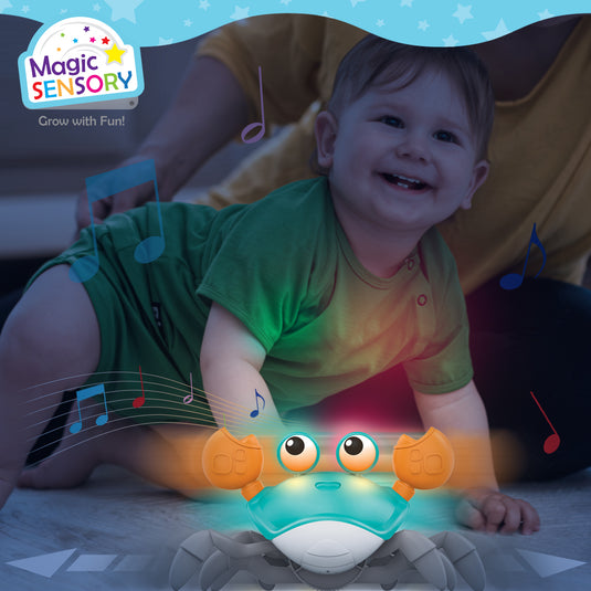 Crawling crab toy lit up and playing music while a smiling baby crawls towards it