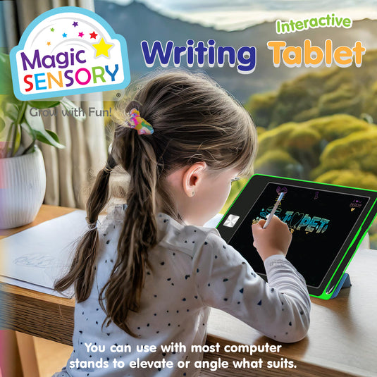 Girl drawing colourful doodles on an LCD writing tablet propped on a stand