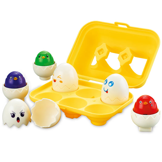 Six Mood Eggs in a yellow carry case with chick toys and egg shells, showing stacking and nesting pieces