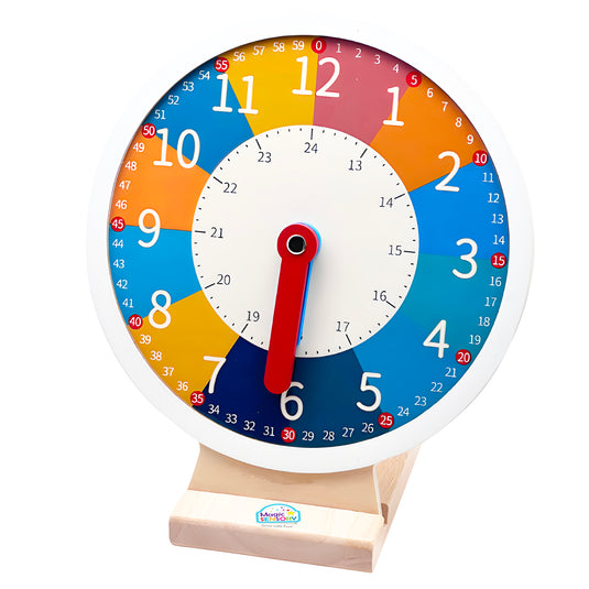 Wooden learning clock with colourful number zones and red movable hands on a wooden stand